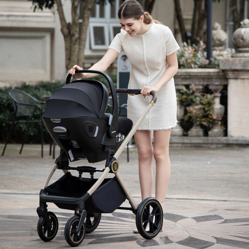 Babymore Kai Travel System Pecan with Base Sandstone